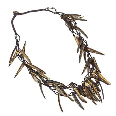 Coconut shell necklace, 'Valiant Warrior' - Handmade Coconut Shell Necklace on Double Strand Nylon Cords