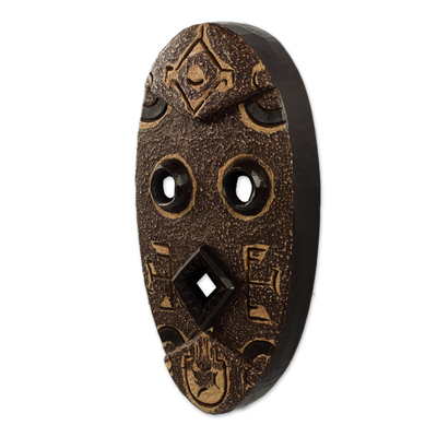 Afrikanische Holzmaske - Auffällige geometrische afrikanische Maske aus strukturiertem braunem Holz