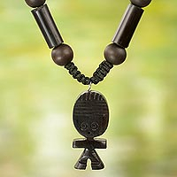 Agate and wood beaded pendant necklace, 'Tsoobi' - Hand Crafted Beaded Necklace with Ebony Wood Doll Pendant