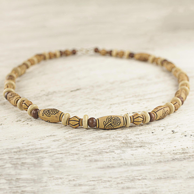 Wood and recycled plastic beaded necklace, 'Desert Mirage' - Hand Crafted Beaded Necklace with Floral Motif from Ghana