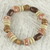 Wood beaded stretch bracelet, 'Strong' - Recycled Plastic Sese Wood Beaded Stretch Bracelet (image 2) thumbail