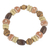 Wood beaded stretch bracelet, 'Strong' - Recycled Plastic Sese Wood Beaded Stretch Bracelet thumbail