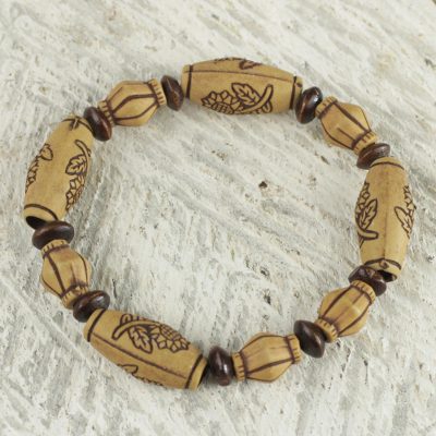 Wood beaded stretch bracelet, 'Sunflower Power' - Sunflower Sese Wood Beaded Recycled Plastic Stretch Bracelet