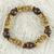 Wood and recycled plastic stretch bracelet, 'Chocolate Escape' - Artisan Crafted Sese Wood Recycled Plastic Stretch Bracelet thumbail