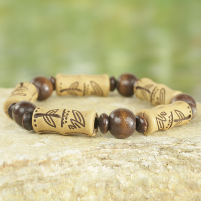 Wood and recycled plastic stretch bracelet, 'Chocolate Escape' - Artisan Crafted Sese Wood Recycled Plastic Stretch Bracelet