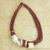 Leather and horn torsade necklace, 'Sougri Paprika' - Handmade Red Leather Necklace with Horn and Bone Pendants