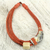 Leather and horn pendant necklace, 'Sougri Orange' - Horn and Bone Pendants on Recycled Beads Orange Necklace (image 2) thumbail
