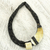 Leather and horn torsade necklace, 'Sougri Black' - Horn and Bone Pendants on Black Leather Necklace thumbail