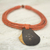 Ebony wood pendant necklace, 'Zacksongo in Orange' - Ebony Wood Pendant Necklace with Orange Leather Cord (image 2c) thumbail