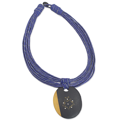 Ebony wood pendant necklace, 'Zacksongo in Blue' - Ebony Wood Pendant Necklace with Blue Leather Cord