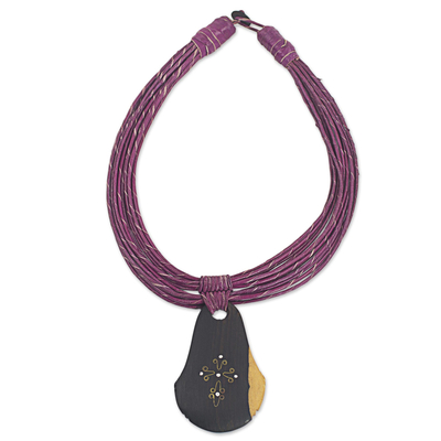 Ebony wood pendant necklace, 'Zacksongo in Plum' - Ebony Wood Pendant Necklace with Plum Leather Cord