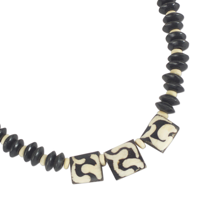 Wood and bone beaded pendant necklace, 'Rustic Fortune' - Wood and Bone Beaded Pendant Necklace from Ghana