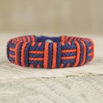 Cord bracelet, 'Blue and Orange Kente Power' - Blue and Orange Cord Striped Bracelet Handmade in Ghana