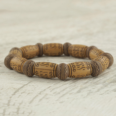 Beaded stretch bracelet, 'Dream Token' - Star Motif Recycled Bead Stretch Bracelet Ghana Jewelry