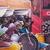 'Rush Hour' - Acrylic Caricature Painting of a Market Scene from Ghana