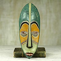 African wood mask, 'Bring Good News'