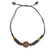Wood pendant necklace, 'Round Might' - Sese Wood and Bamboo Cord Pendant Necklace from Ghana thumbail