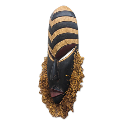 Afrikanische Holzmaske - Handgeschnitzte afrikanische Maske aus Holz und Bast aus Ghana