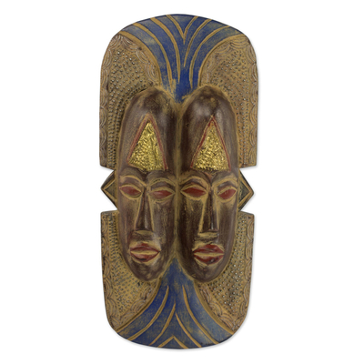 Afrikanische Holzmaske - Zwei Gesichter, eine afrikanische Maske, handgeschnitzte Kunst aus verwittertem Holz