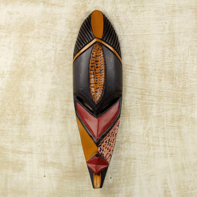 African wood mask, 'Akpe Gratitude' - Hand Crafted Sese Wood African Wall Mask in Black and Orange