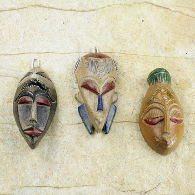 African wood masks, 'Wisdom and Happiness' (set of 3) - Set of 3 Sese Wood African Masks Handcrafted in Ghana