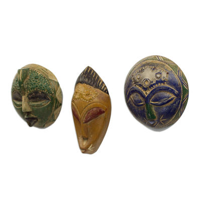 African wood masks, 'Sefam' (set of 3) - Set of 3 Petite Handcrafted Sese Wood African Masks