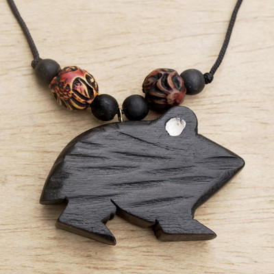 Wood pendant necklace, 'Charming Frog' - Handcrafted Sese Wood Frog Pendant Necklace from Ghana