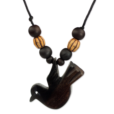 Wood pendant necklace, 'Victory Bird' - Peace Bird Artisan Crafted Wood Pendant Necklace from Ghana