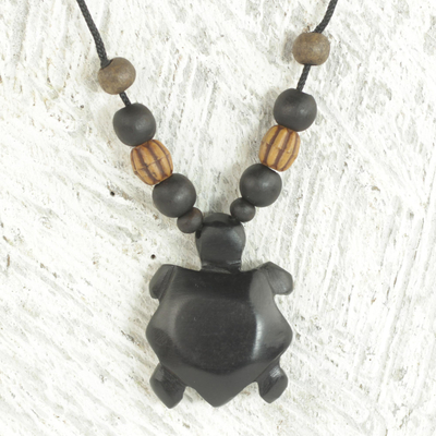 Wood and bamboo pendant necklace, 'Longevity Tortoise' - Sese Wood and Bamboo Tortoise Pendant Necklace from Ghana