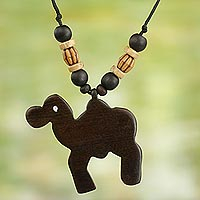 Wood pendant necklace, 'Whimsical Camel' - Artisan Crafted Camel Wood Pendant Necklace from Ghana