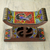 Perlen dekorativer Holzhocker, „Adinkra Sankofa“ – Dekorativer perlenbesetzter afrikanischer Holz-Schema mit Adinkra-Symbolen