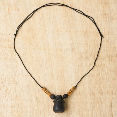 Wood pendant necklace, 'Village Hut' - Sese Wood Adjustable Pendant Necklace from Ghana