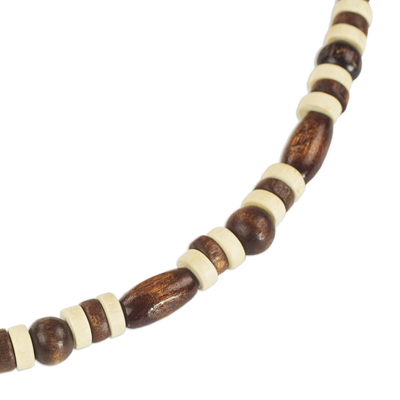 Wood beaded necklace, 'Ahobrasie Virtue' - Hand Crafted Sese Wood Beaded Necklace by Ghanaian Artisans