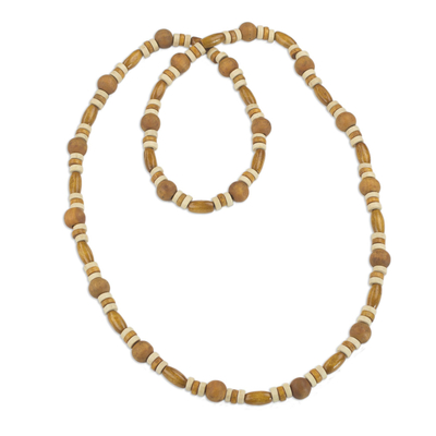 Wood beaded necklace, 'Adipa Joy' - Hand Crafted Sese Wood Beaded Necklace by Ghanaian Artisans