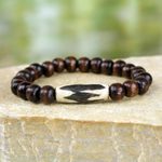Wood and bone beaded stretch bracelet, 'Wonderful Atinka Pa' - Sese Wood and Bone Beaded Bracelet by Ghanaian Artisans