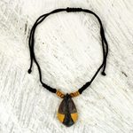 Wood pendant necklace, 'Manubea' - African Style Hand Carved Wood Necklace with Female Mask