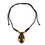 Wood pendant necklace, 'Manubea' - African Style Hand Carved Wood Necklace with Female Mask
