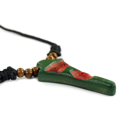 Wood pendant necklace, 'Ghanaian Eagle' - Adjustable Sese Wood Necklace in Red and Green from Ghana