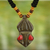 Wood pendant necklace, 'Gyau Atiko' - Hand Carved Wooden Pendant and Cord Necklace from Ghana thumbail