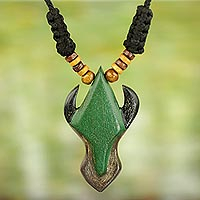 Wood pendant necklace, 'African Horns' - Adjustable Sese Wood Pendant Necklace in Green from Ghana