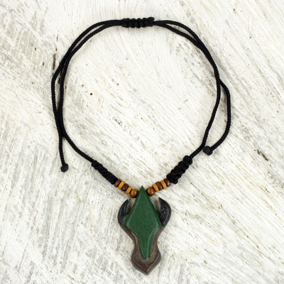 Wood pendant necklace, 'African Horns' - Adjustable Sese Wood Pendant Necklace in Green from Ghana