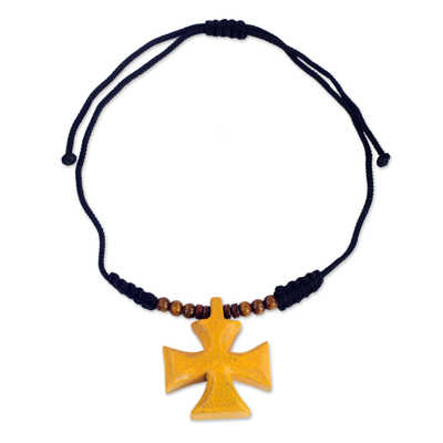 Wood pendant necklace, 'Cross of Divinity' - Adjustable Sese Wood Yellow Cross Necklace from Ghana