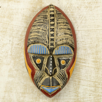 Afrikanische Holzmaske - Wohlstand ist eine handgefertigte Wandmaske aus afrikanischem Holz