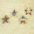 Wood ornaments, 'Nsruma Pride' (set of 4) - Four Sese Wood Star Ornaments in Red Blue and Beige (image 2b) thumbail