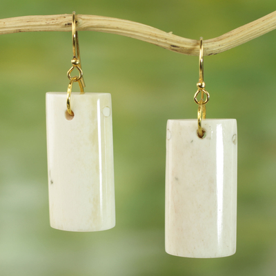 Bone dangle earrings, 'Afterglow' - Hand Crafted Cow Bone Dangle Earrings from West Africa