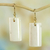 Bone dangle earrings, 'Afterglow' - Hand Crafted Cow Bone Dangle Earrings from West Africa