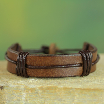 Men's leather wristband bracelet, 'Enduring Strength in Brown' - Men's Brown Leather Wristband Bracelet from Ghana