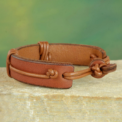 Men's leather wristband bracelet, 'Enduring Strength in Tan' - Men's Brown Leather Wristband Bracelet from Ghana