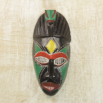 Afrikanische Holzmaske - Handgefertigte Wandmaske aus Sese-Holz aus Ghana