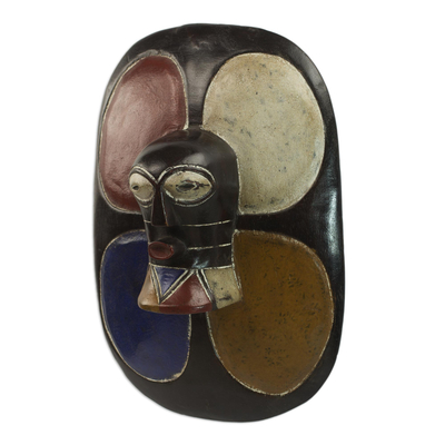 African wood mask, 'Colorful Shield' - Multicolor Hand Carved Sese Wood Guro Shield Mask from Ghana